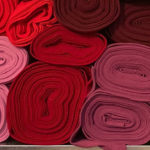 anna * pollack, viele bunte Stoffrollen