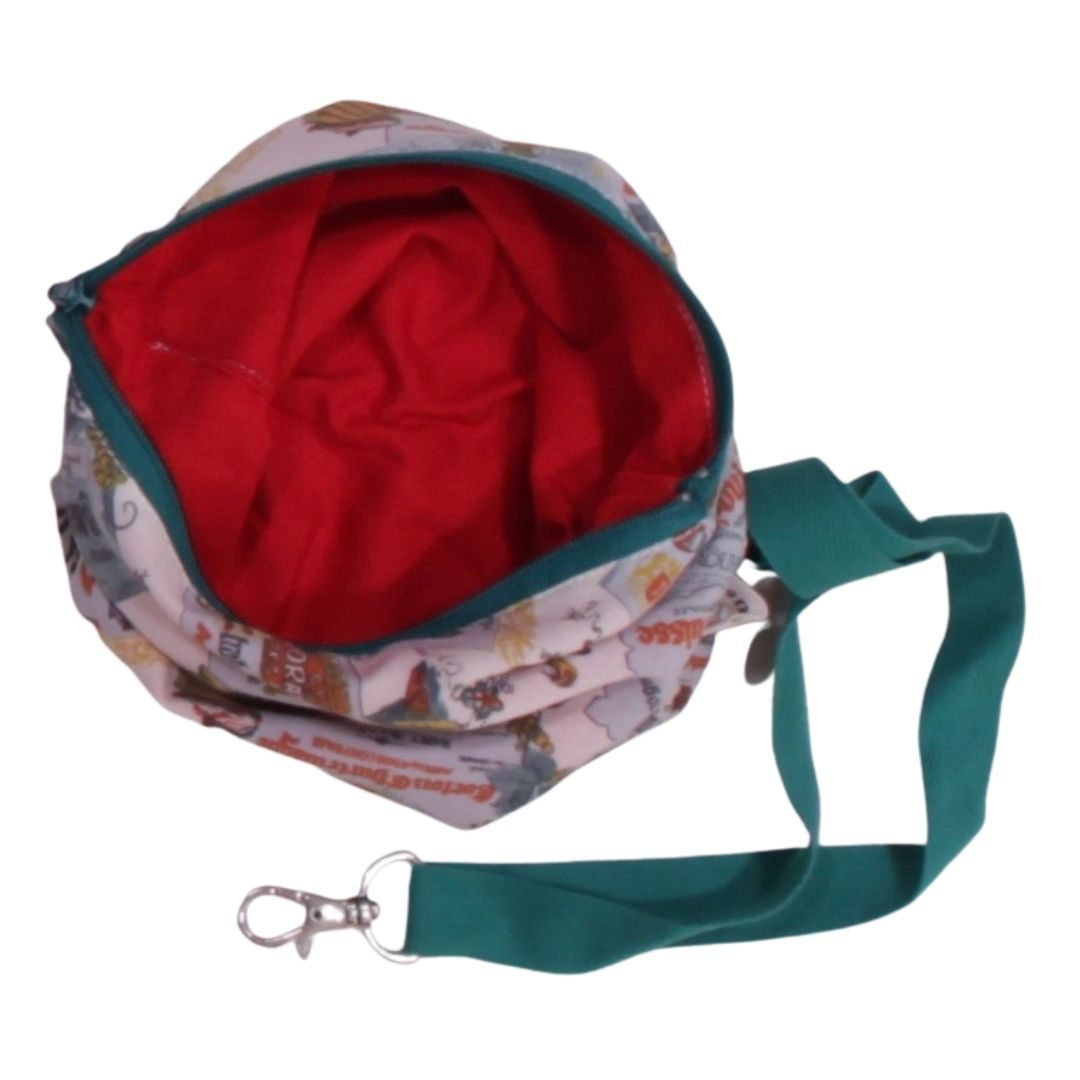 anna * pollack, Täschchen gemustert, rot gefüttert, mit Zipp und Gurt